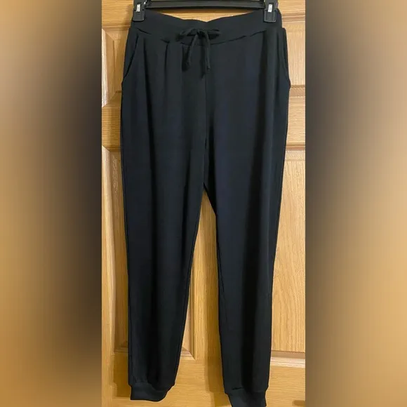 NWT Bebe black lounge set with rhinestone logo. Hoodie and jogger, Sz. Small.