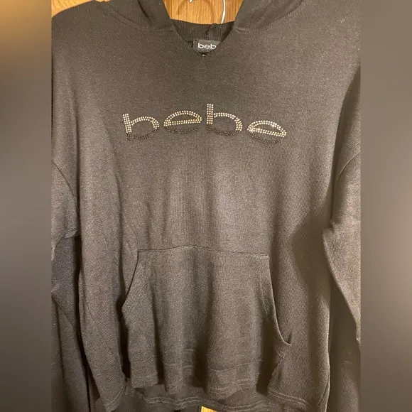 NWT Bebe black lounge set with rhinestone logo. Hoodie and jogger, Sz. Small.