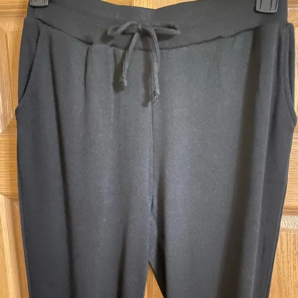 NWT Bebe black lounge set with rhinestone logo. Hoodie and jogger, Sz. Small.