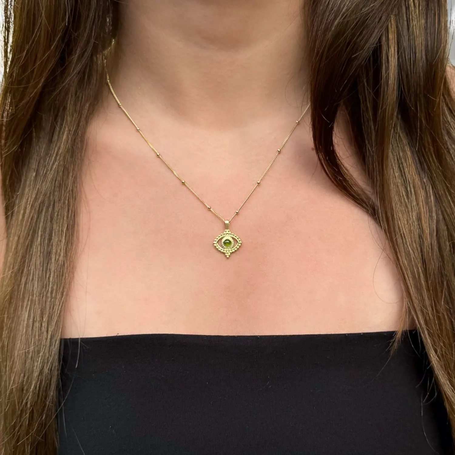 Tourmaline Evil Eye Pendant on a Stylish Gold Chain Necklace